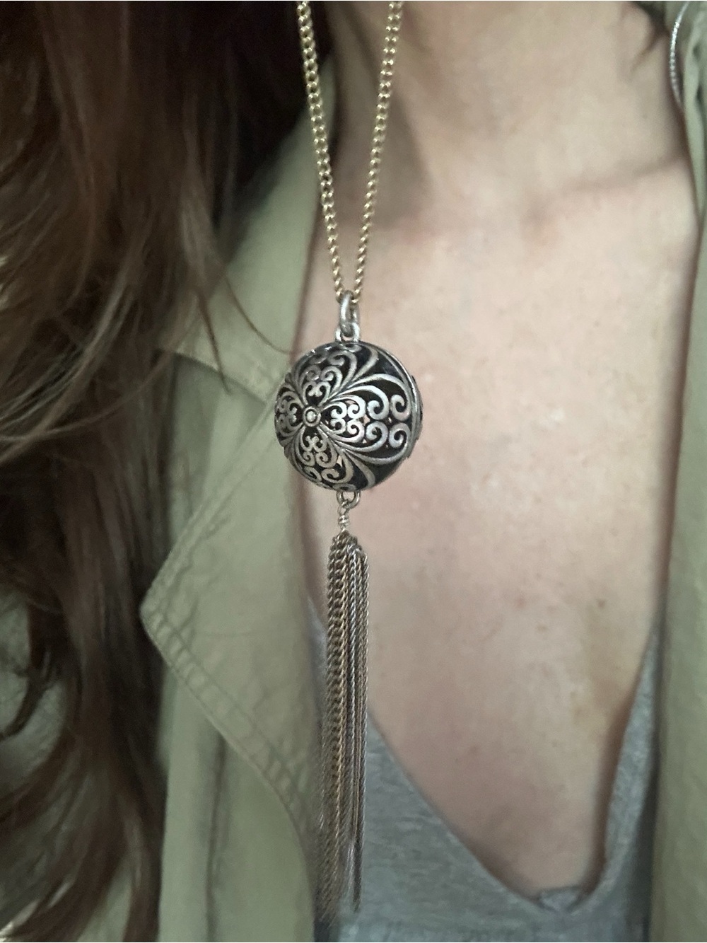 Ornate Silver-Tone Filigree Ball Pendant Necklace with Tassel